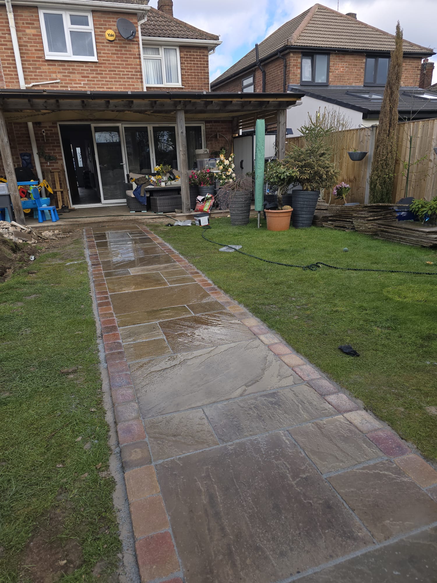 Garden pathway with paving and landscaping