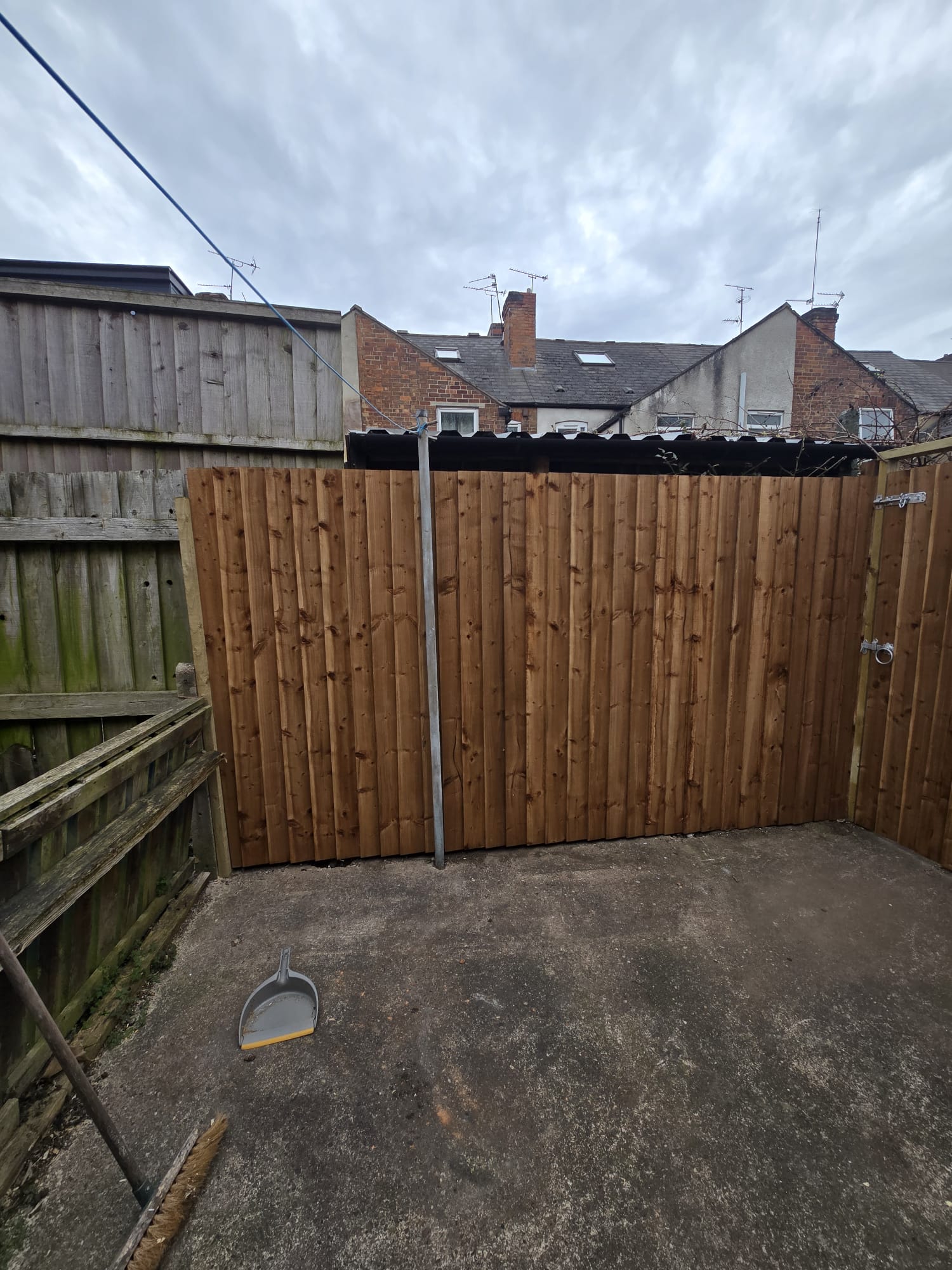 Wooden fence with metal gate