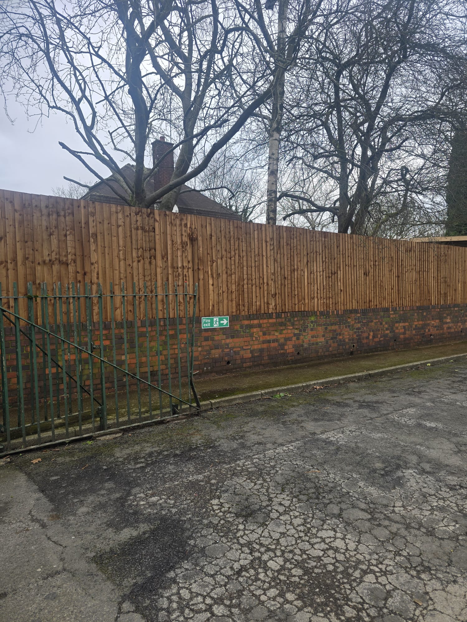 Fencing with brick base perimeter